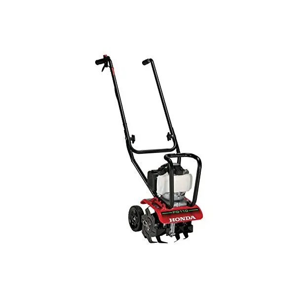 A red and black garden tool is on the ground