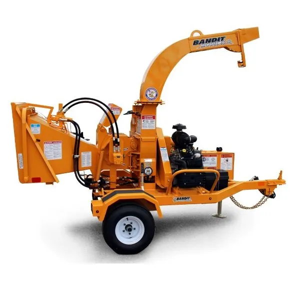 A small orange and yellow truck with a large engine.