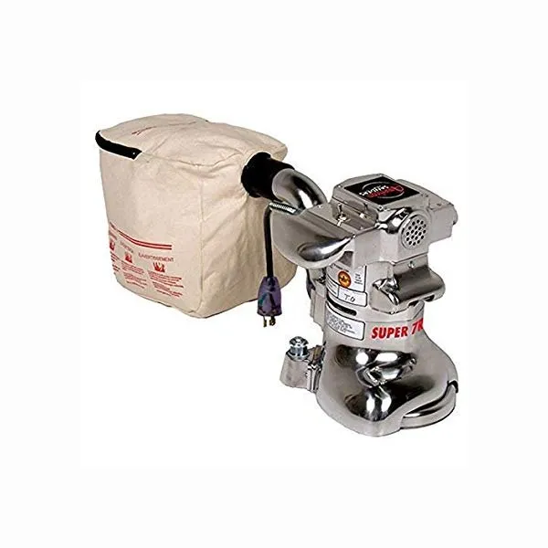A silver machine with a bag on top of it.