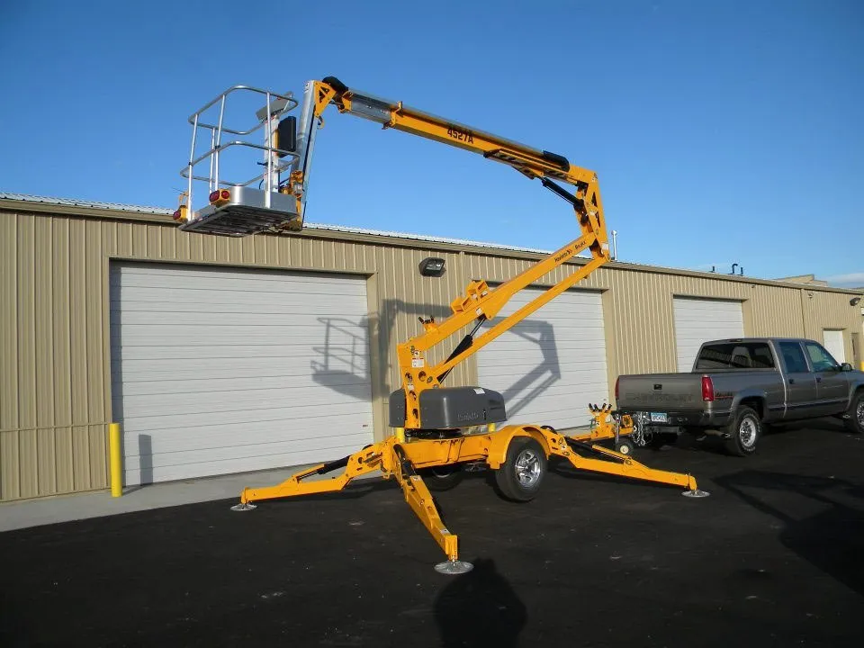 A yellow and black truck and trailer