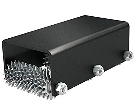 A black box with spikes on top of it.