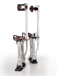 A pair of silver stilts with black handles.