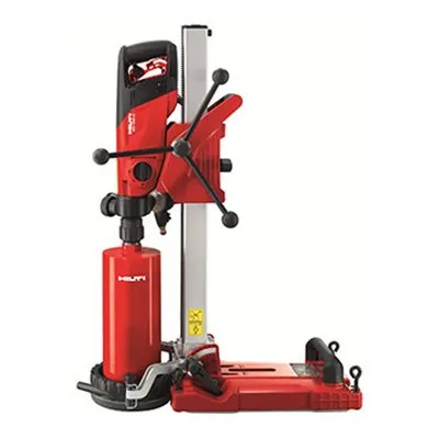 A red drill press with a tool holder attached to it.