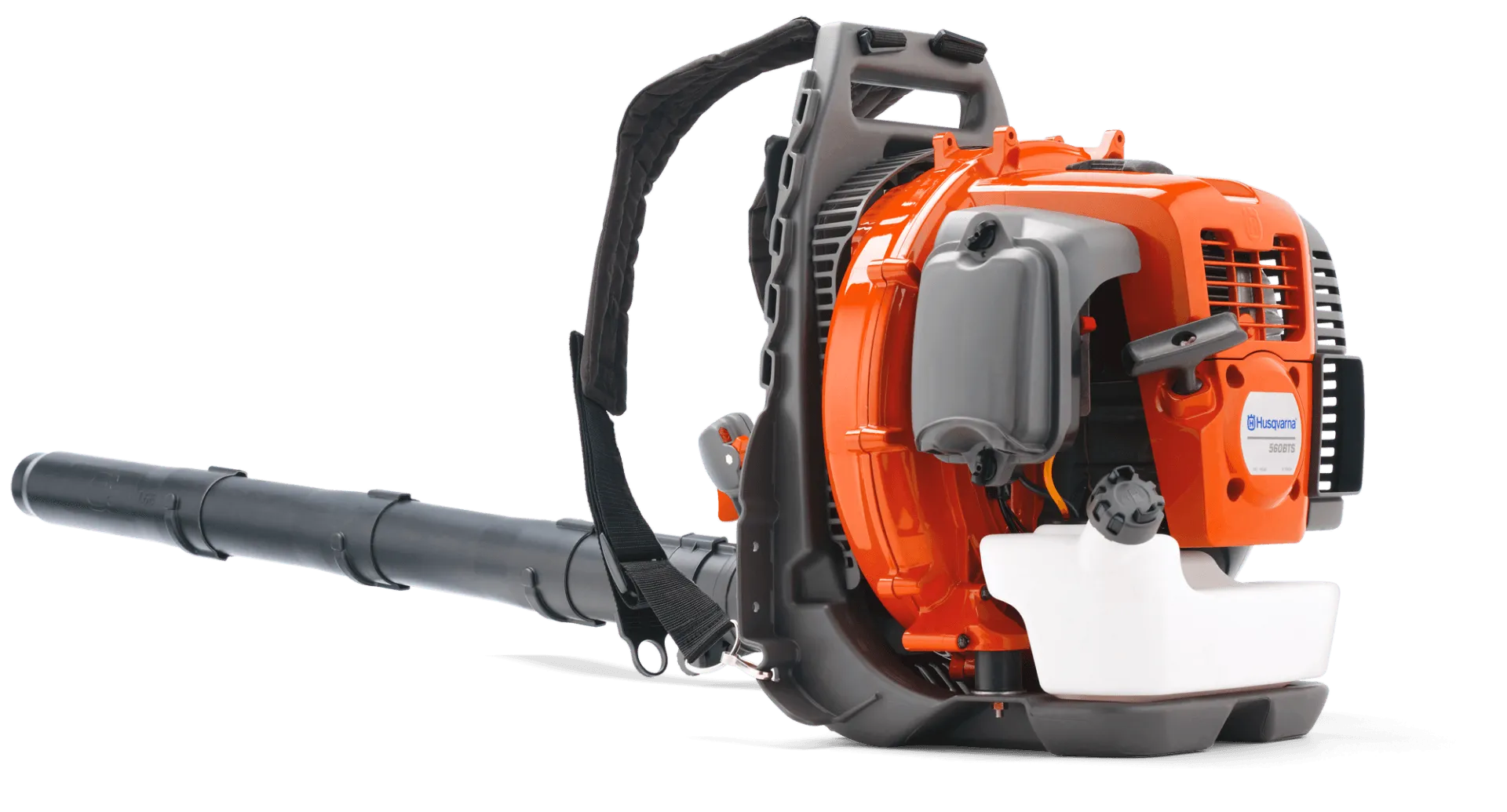 A close up of the engine on an orange and black machine