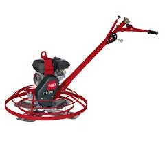 A red power trowel with two wheels and a handle.