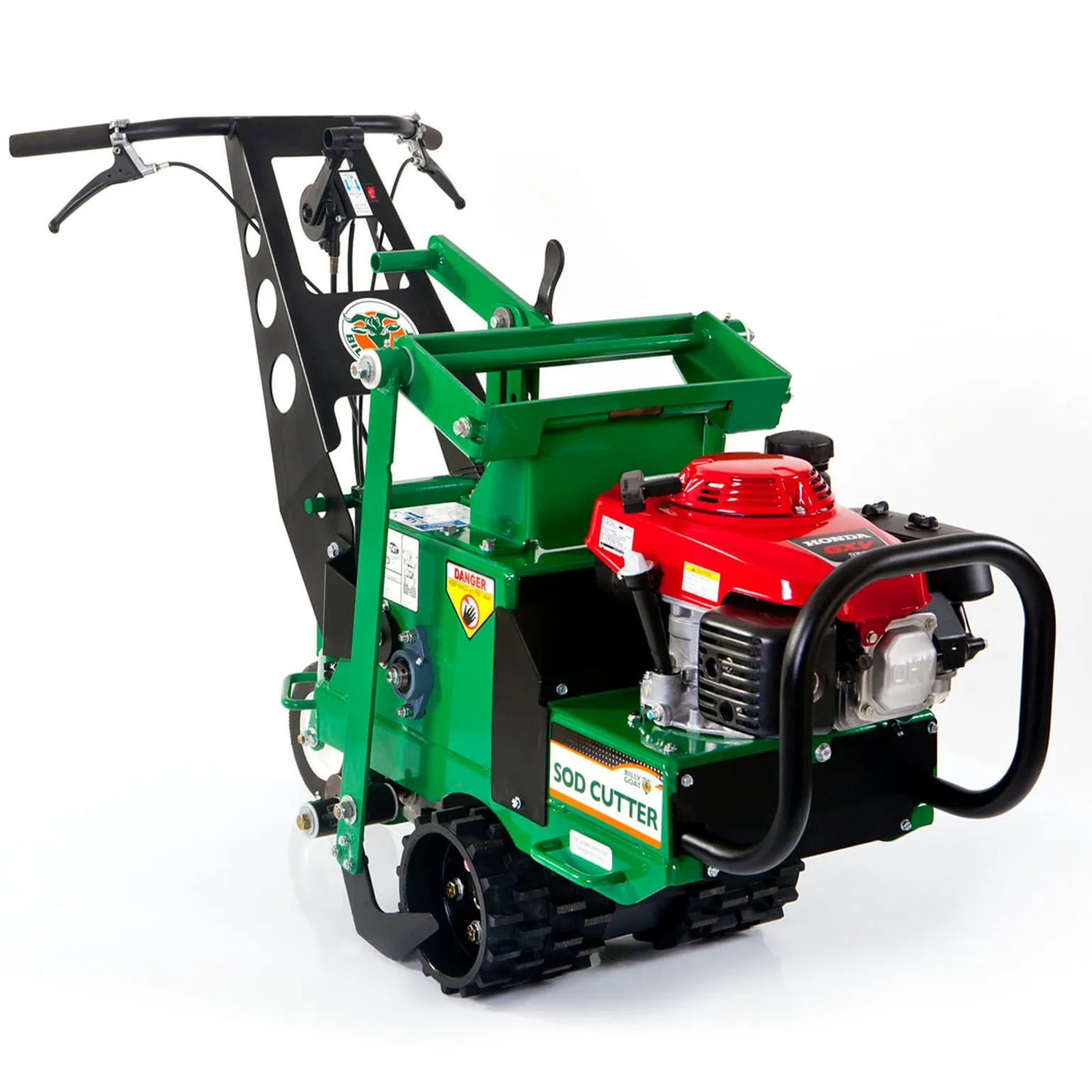 A green and red machine is on the ground